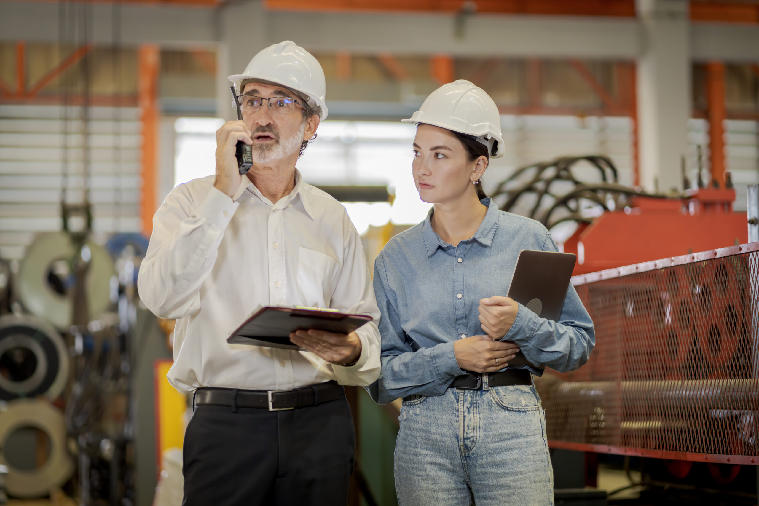 A new generation of engineers in a metal sheet factory.  Studying work methods from supervisors or colleagues and studying by yourself  be taught professionally