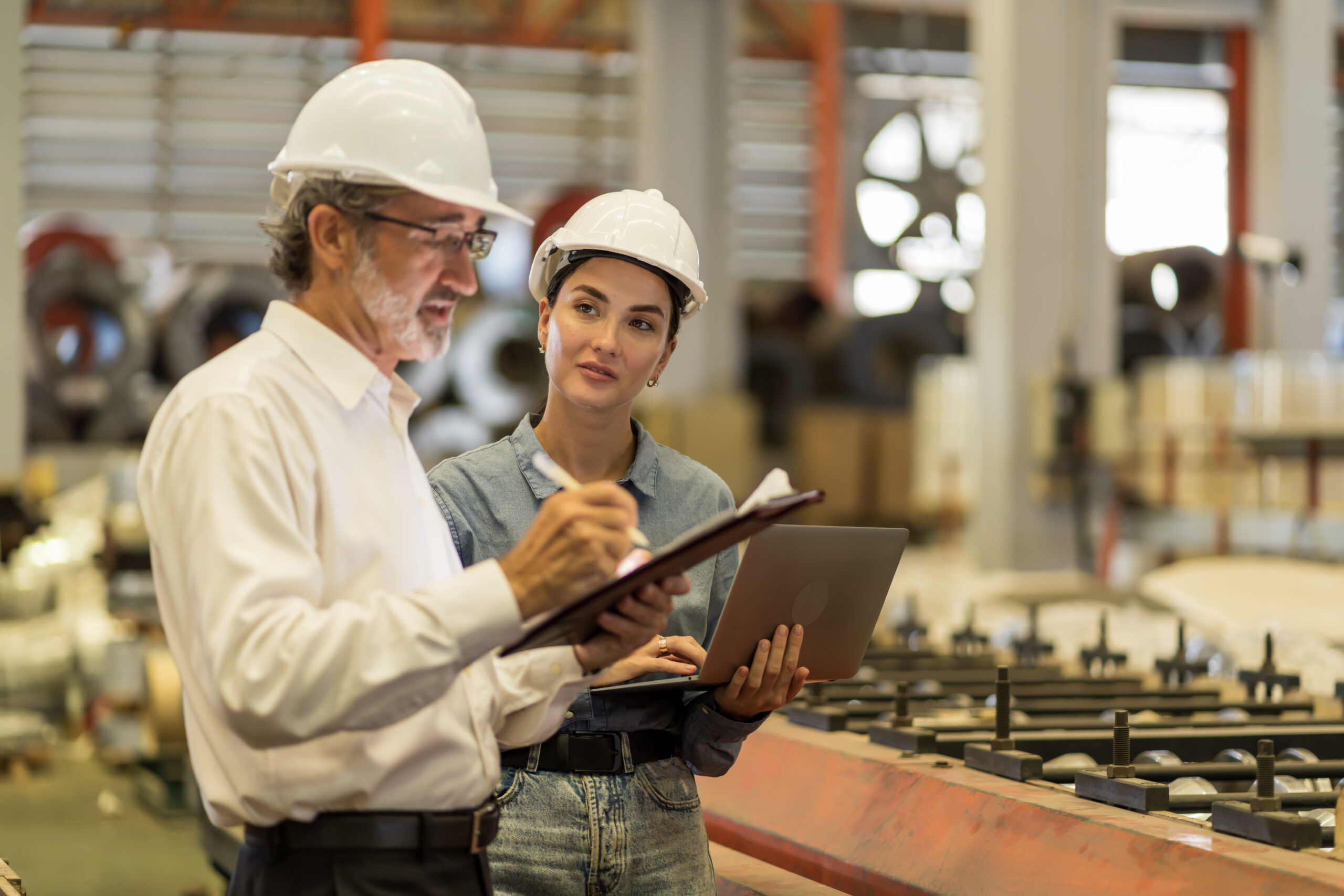 A new generation of engineers in a metal sheet factory. Studying work methods from supervisors or colleagues and studying by yourself be taught professionally