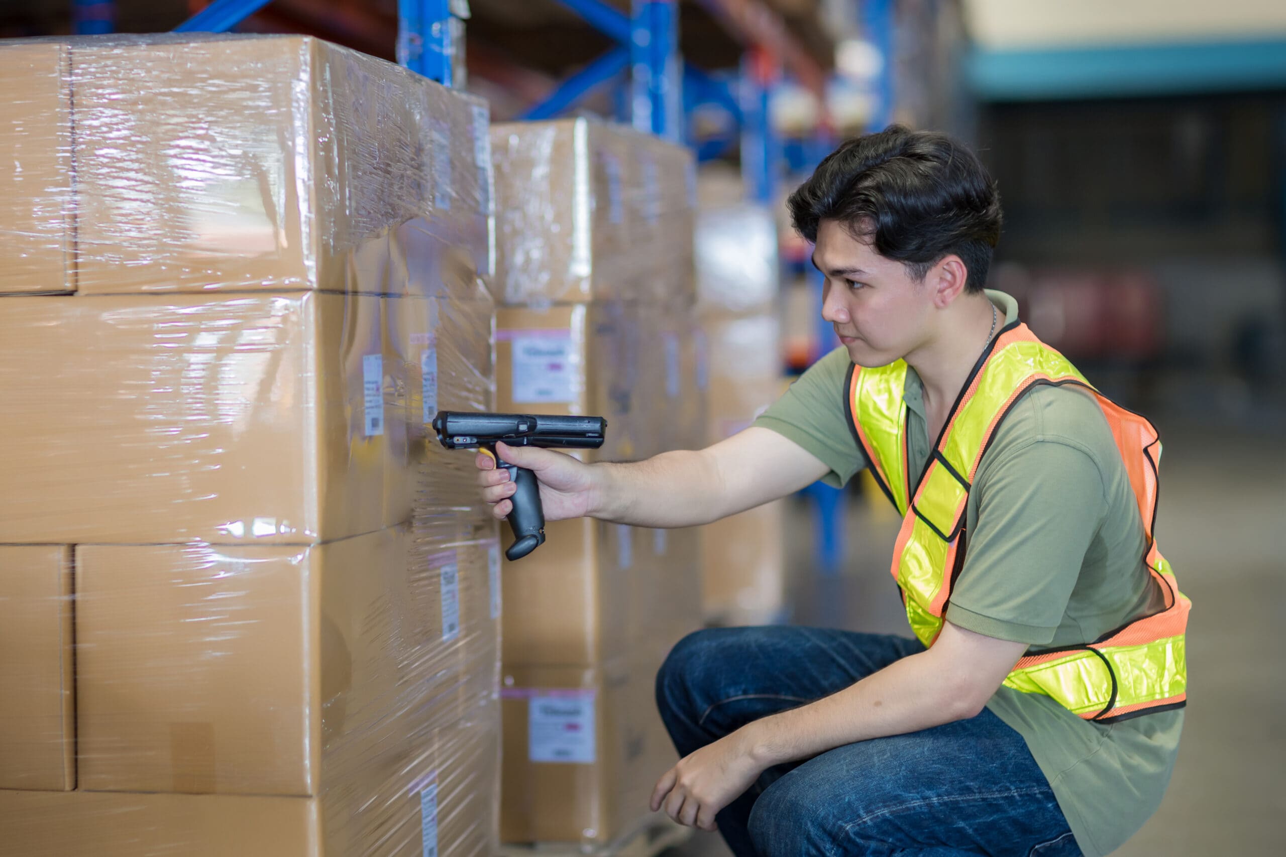 Warehouse worker working in warehouse storage. Foreman or worker work at factory site check up products in site. Inventory worker working in  factory Storehouse